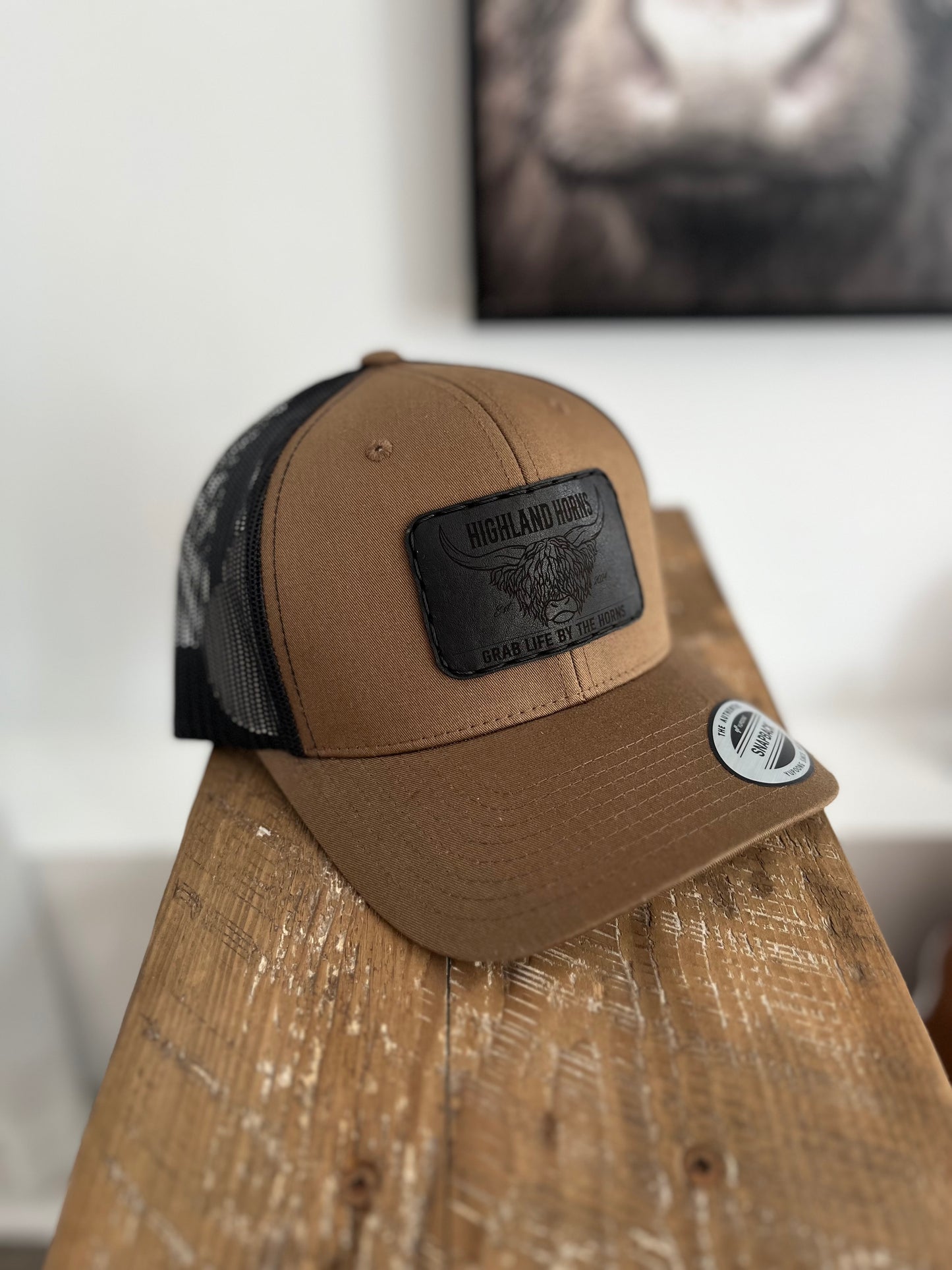 Brown coyote black leather cap