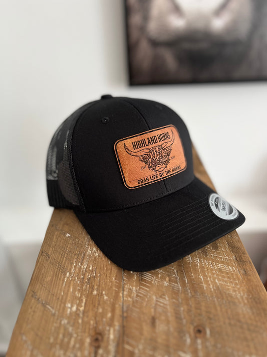 Black cap brown leather